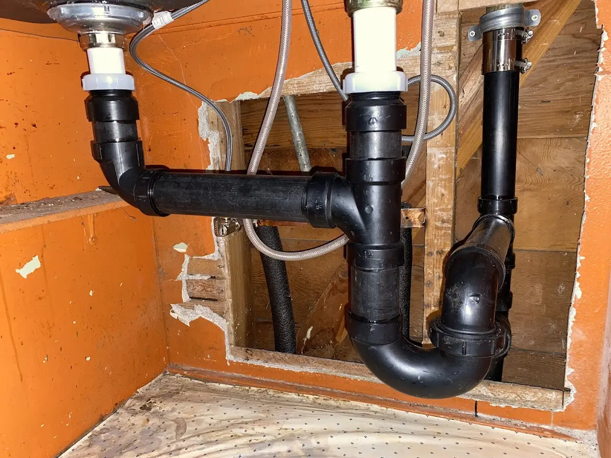 Professional Garbage Disposal Repair equipment and tools on the job in Smithfield